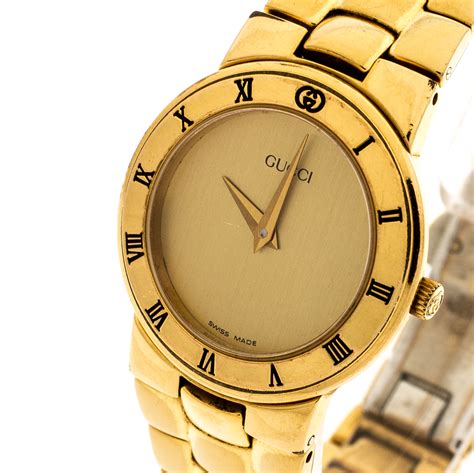 gucci gold watch